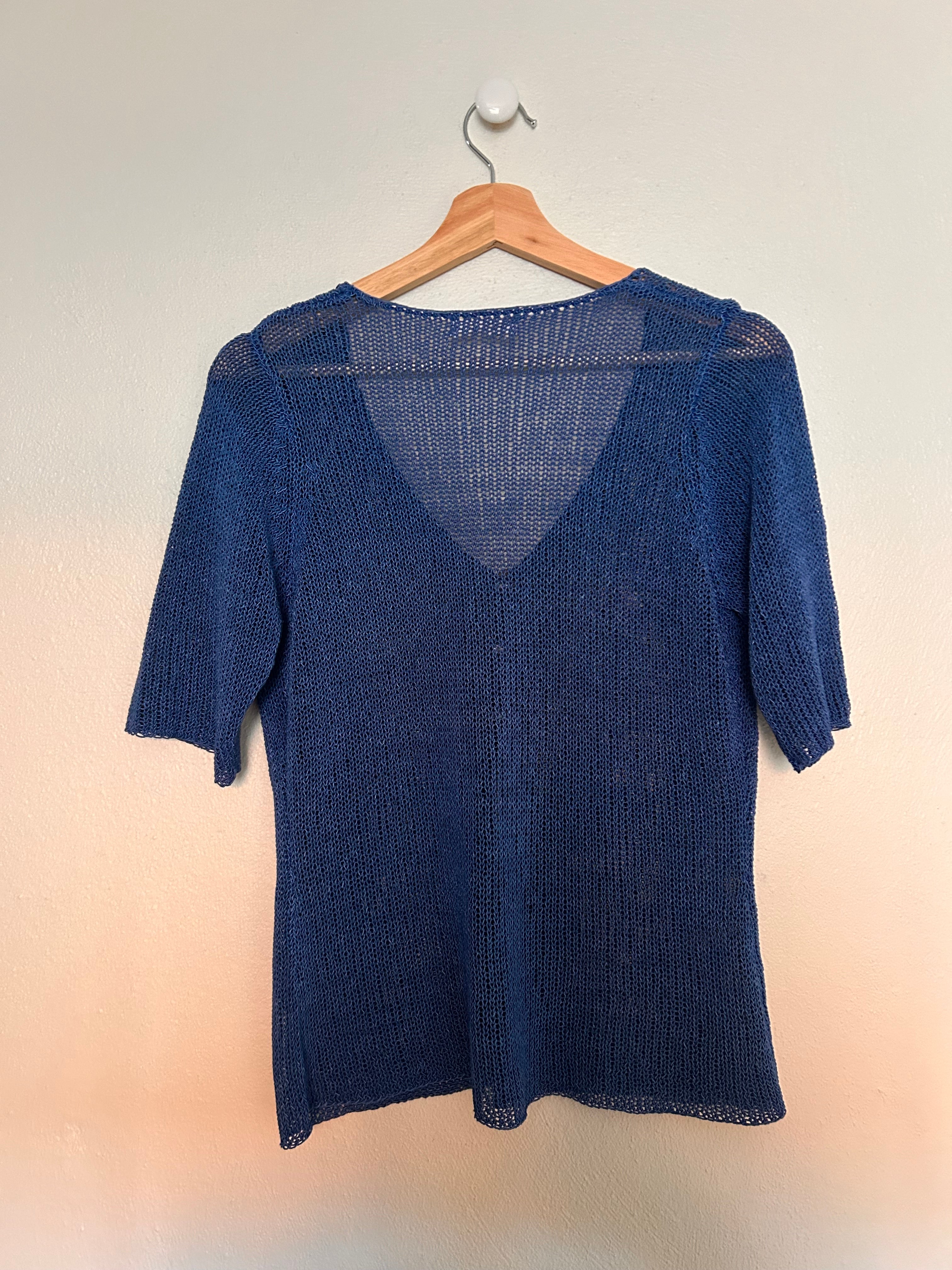 Strik T-cardigan med perlemorknapper